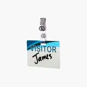 Reusable visitor badge with metal bulldog clip attachment